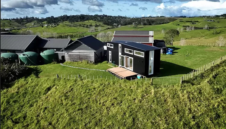 Designer's Mirror-Filled Tiny House Is a Family Home for Two